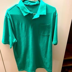 L heat gear under senior golf polo with pocket. Small blemish pictured.
